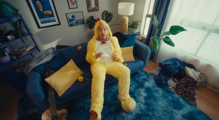Person in chicken costume for commercial