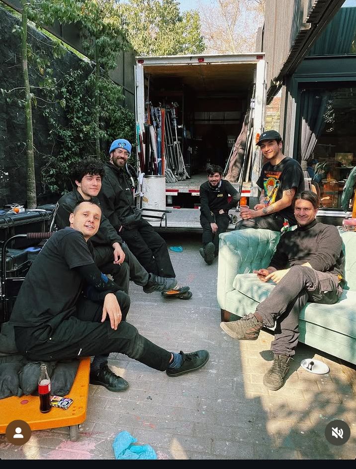 Crew members relaxing on set