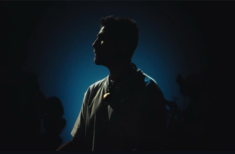 Silhouette portrait with blue background
